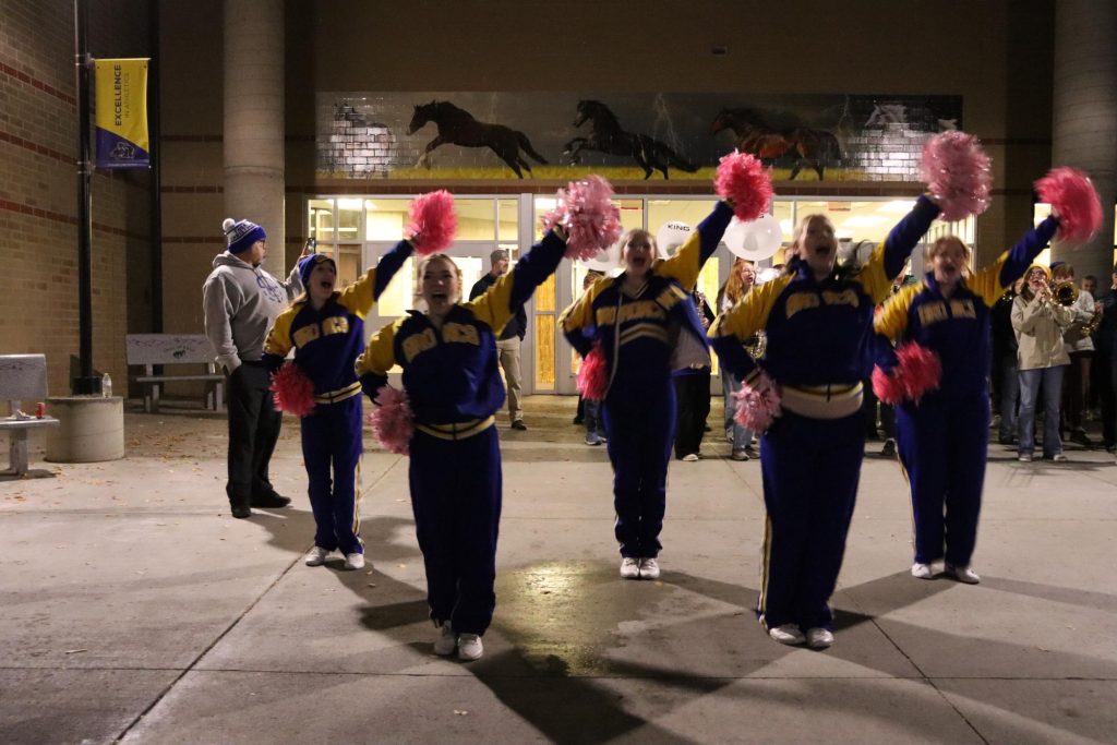 SHS cheer team performing at the Burning of the Bronc celebration. (Brian Rizer)