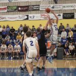 Junior Forward Nate Minor goes for a put-back layup. (Courtesy Ravin Carter)