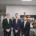 (From left to right) Juniors Nick Matheeny, Cameron Sulz, and Lorenzo Cherry pose in Speech and Debate dress. (Courtesy Kadia Miller)